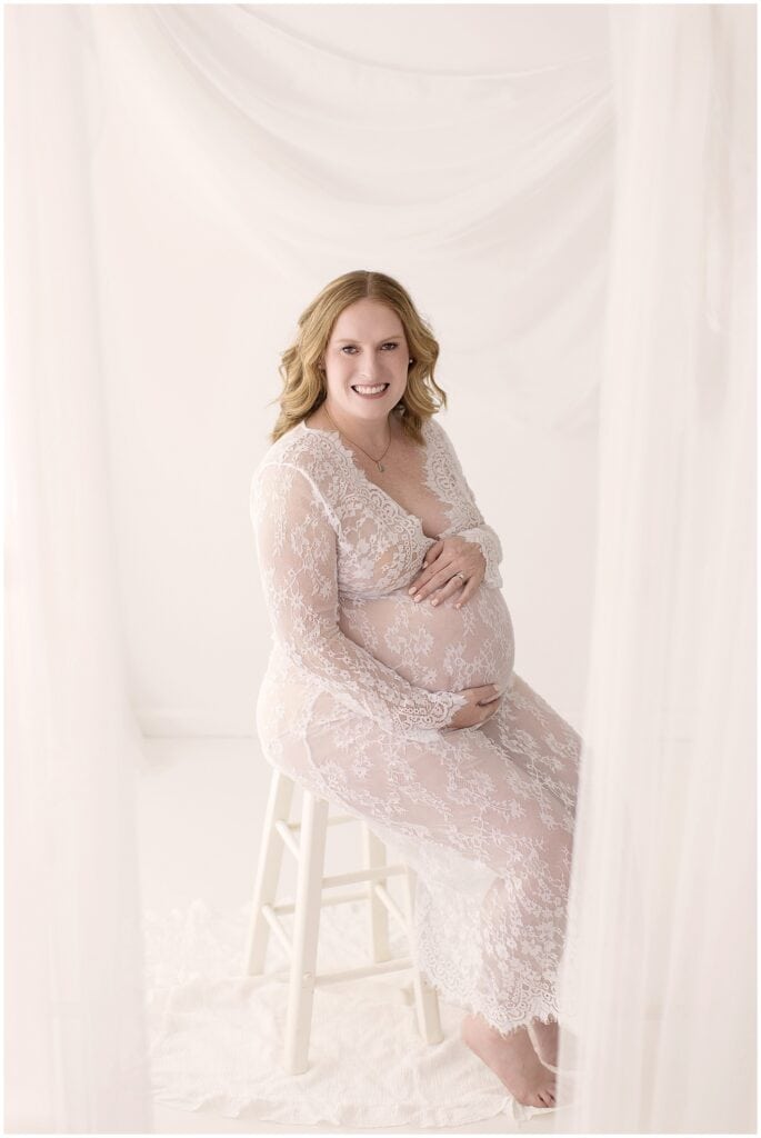 Beautiful solo maternity portrait showcasing pregnancy glow in Cleveland photography studio