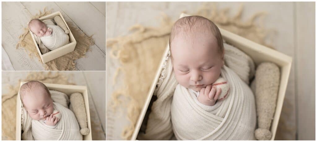 Creative baseball diamond themed newborn photography setup for baby Benny by Brunswick Ohio newborn photographer