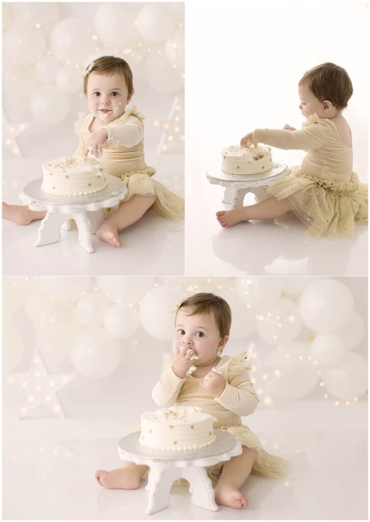 One-year-old enjoying her cake from Honey Bee Bakery in Medina during cake smash session.