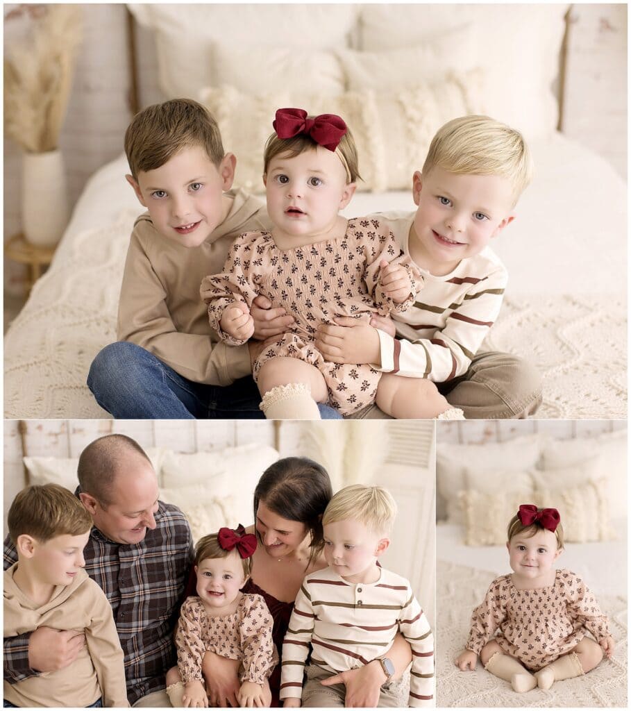 Family cuddling together on cozy bed during Akron cake smash photographer session.