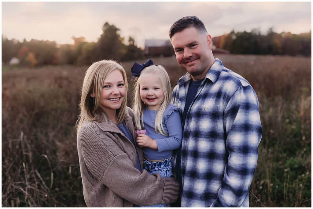 Family together during fall photo session in Brunswick Ohio
