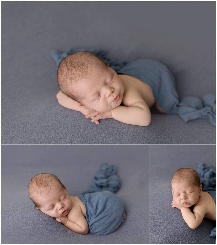 baby boy newborn session in Cleveland Ohio featuring soft blue wrap and studio backdrop