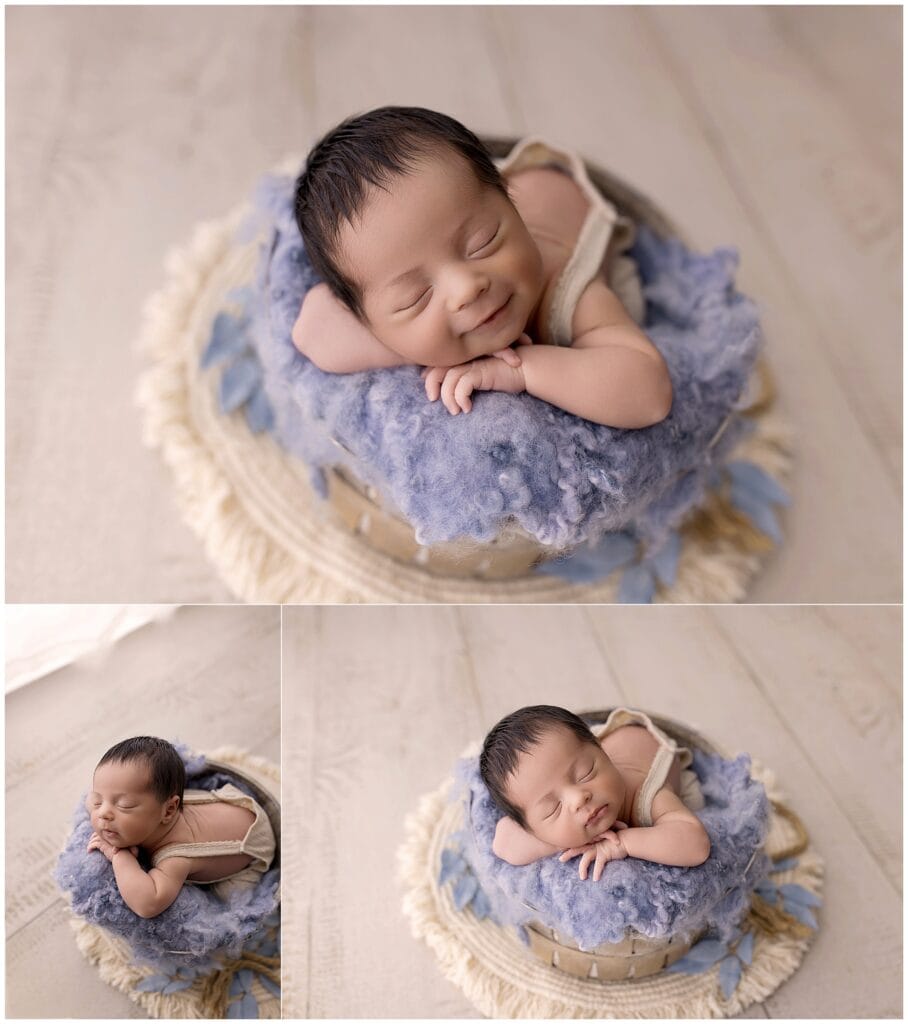 Newborn baby boy posed in blue bucket setup at Medina Ohio newborn studio